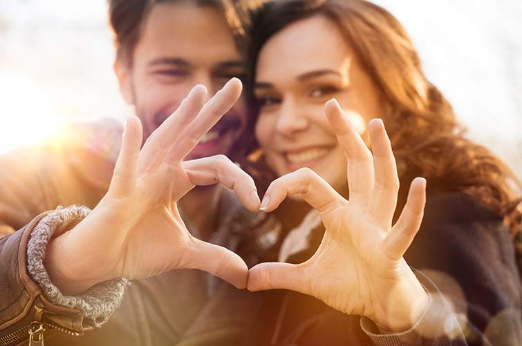 Couple Making Heart Sign New Commitment: Upgrade Don’t Replay